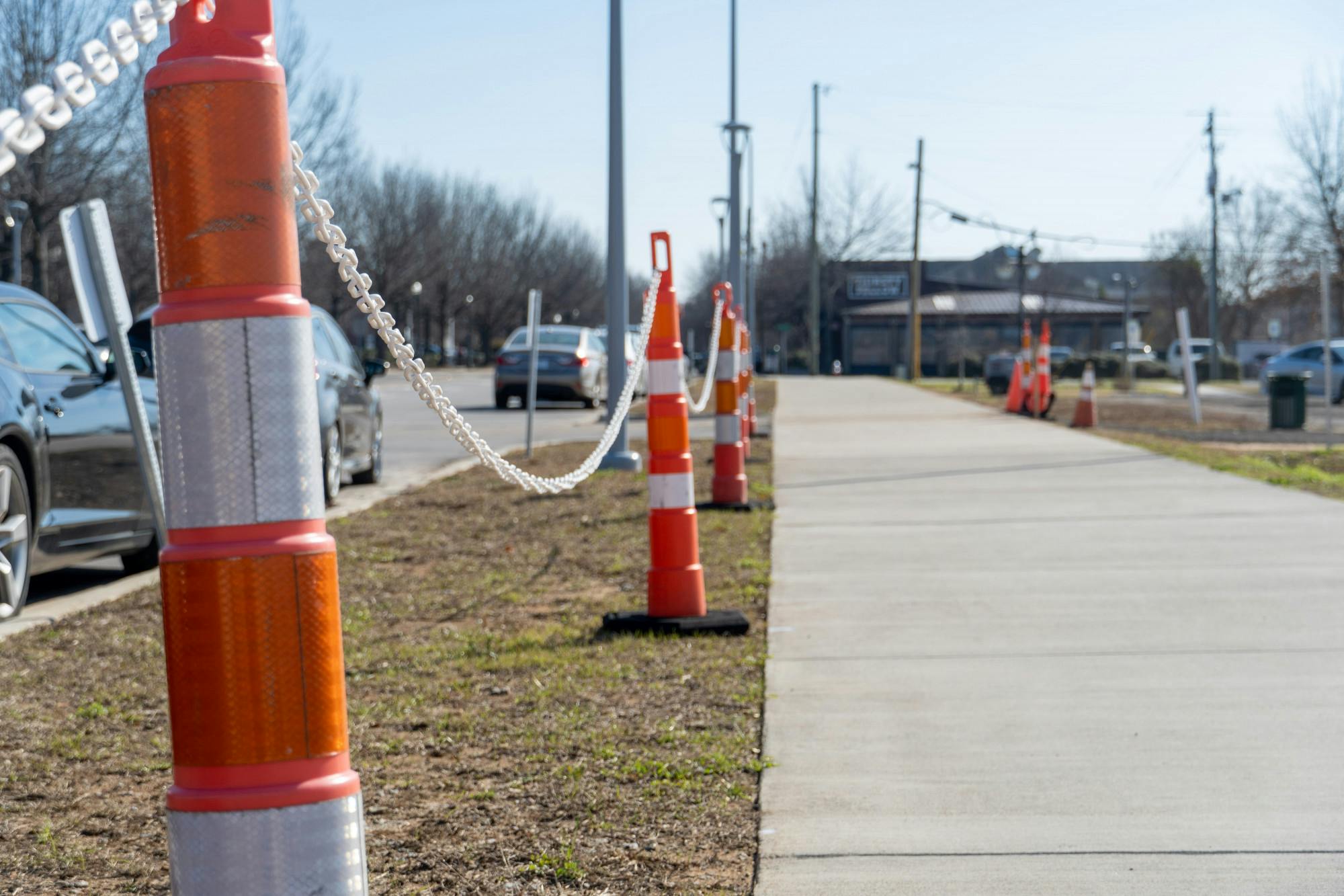 A collection of construction cones sit outside of a parking lot that will soon be home to a new off-campus housing development on Jan. 10, 2022. &nbsp;The university has made moves to construct more housing options in response to the increasing number of USC students coming to campus every semester.