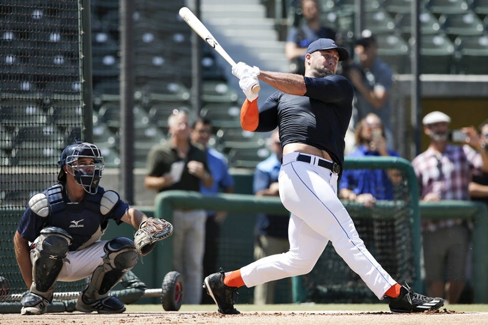 Former NFL quarterback Tim Tebow takes batting practice at USC&apos;s Dedeaux Field in Los Angeles to showcase his skills at a private baseball tryout on Tuesday, Aug. 30, 2016. (Robert Gauthier/Los Angeles Times/TNS)