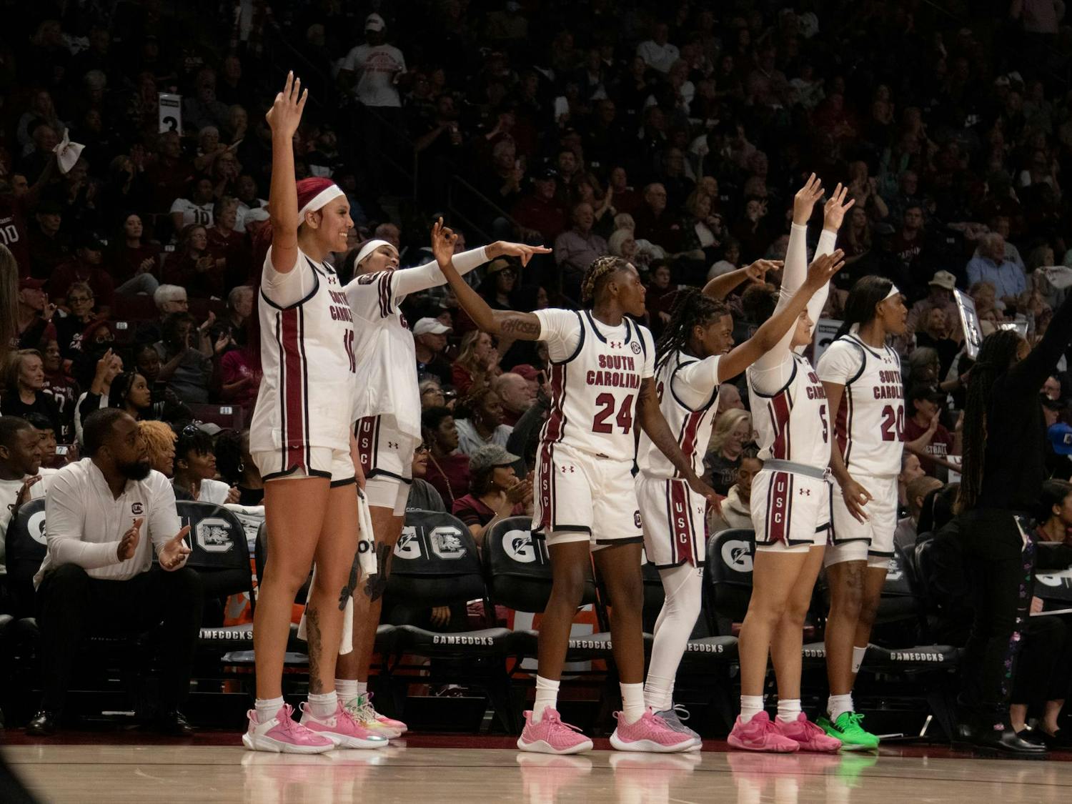 FILE — Members of the South Carolina women's basketball team celebrate a 3-pointer shot during its game against Maryland on Nov. 12, 2023. The Gamecocks defeated the Testudos 114-76, and the team is currently undefeated.