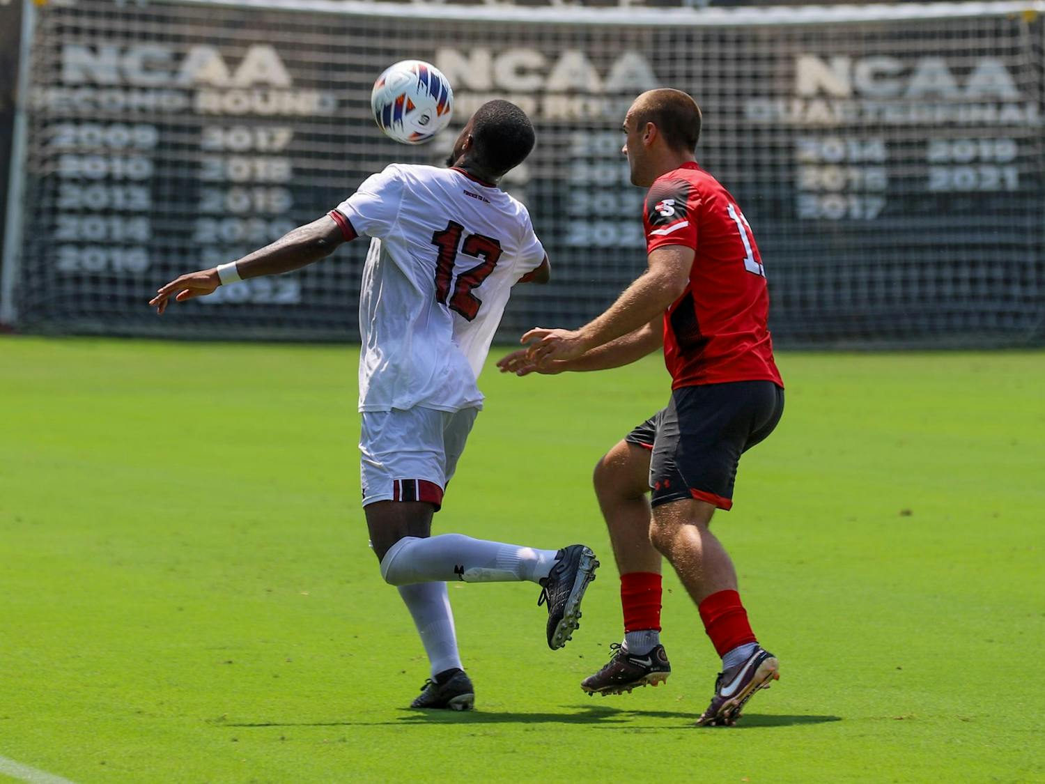 Senior defender Jaiden Ramsay-Kelly uses his body to evade a Gardner-Webb defender while trying to settle the ball. After falling to the Bulldogs, the Gamecocks' record is now 0-1-1.