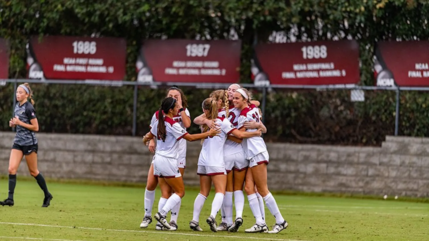 Members of the South Carolina women's soccer team celebrate after a goal in the win against Missouri. The win was the first of the season for the Gamecocks.
