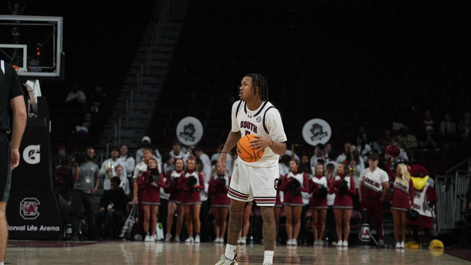 Redshirt senior guard Meechie Johnson surveys the court while bringing the ball up during the Gamecocks’ matchup against Stetson at Colonial Life Arena. The possession helped steady the offense as the Gamecocks continued to control the pace in their win.