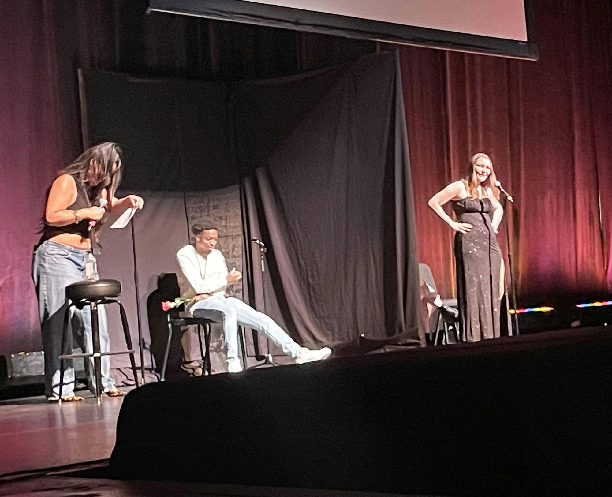 Dating game host Drew Afualo, speaks with the contestants at Koger Center on Jan. 29, 2024. Each round has one bachelor or bachelorette where they choose between three contestants based on the way they answer their questions.