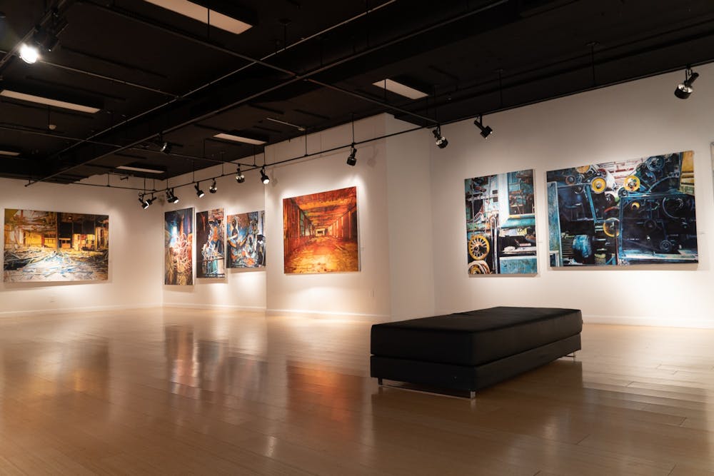 <p>Morgan Craig's exhibit in the McMaster building on Friday 14, 2022. Craig’s paintings are a commentary on capitalism that features art that was almost two decades in the making.&nbsp;</p>