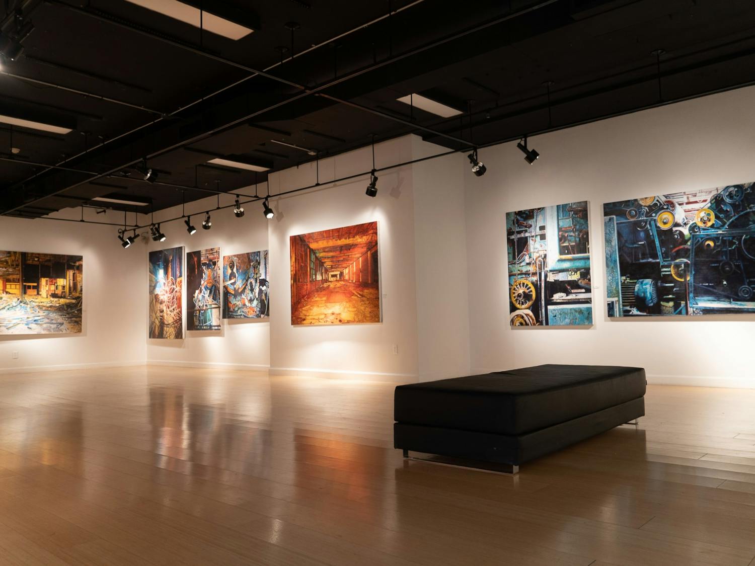 Morgan Craig's exhibit in the McMaster building on Friday 14, 2022. Craig’s paintings are a commentary on capitalism that features art that was almost two decades in the making.&nbsp;