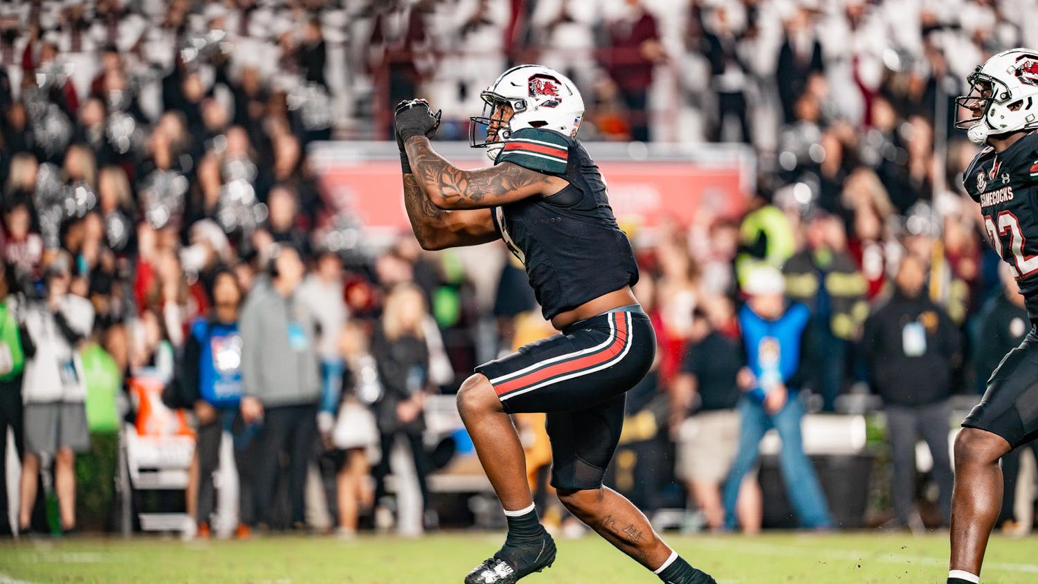 FILE — Then fifth-year edge Kyle Kennard celebrates after a touchdown during South Carolina's matchup against the Mizzou Tigers on Nov. 16, 2025 at Williams-Brice Stadium. Kennard was selected as the 125th pick of the NFL Draft by the Los Angeles Chargers.