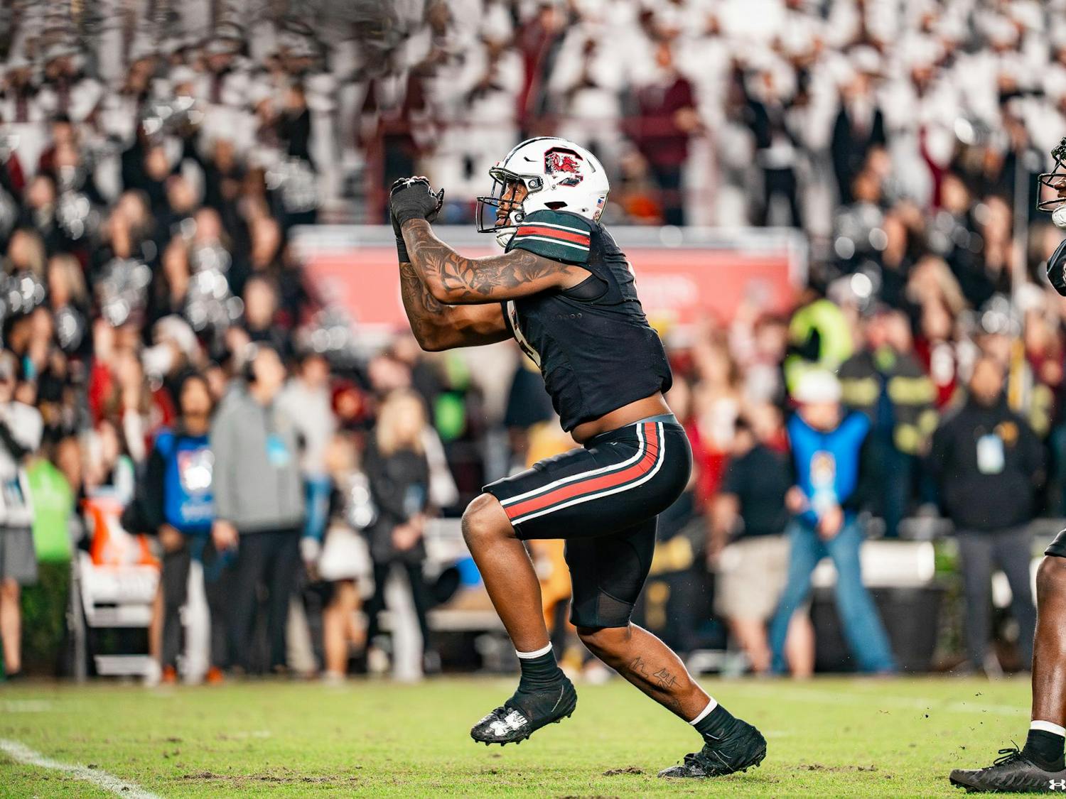 FILE — Then fifth-year edge Kyle Kennard celebrates after a touchdown during South Carolina's matchup against the Mizzou Tigers on Nov. 16, 2025 at Williams-Brice Stadium. Kennard was selected as the 125th pick of the NFL Draft by the Los Angeles Chargers.