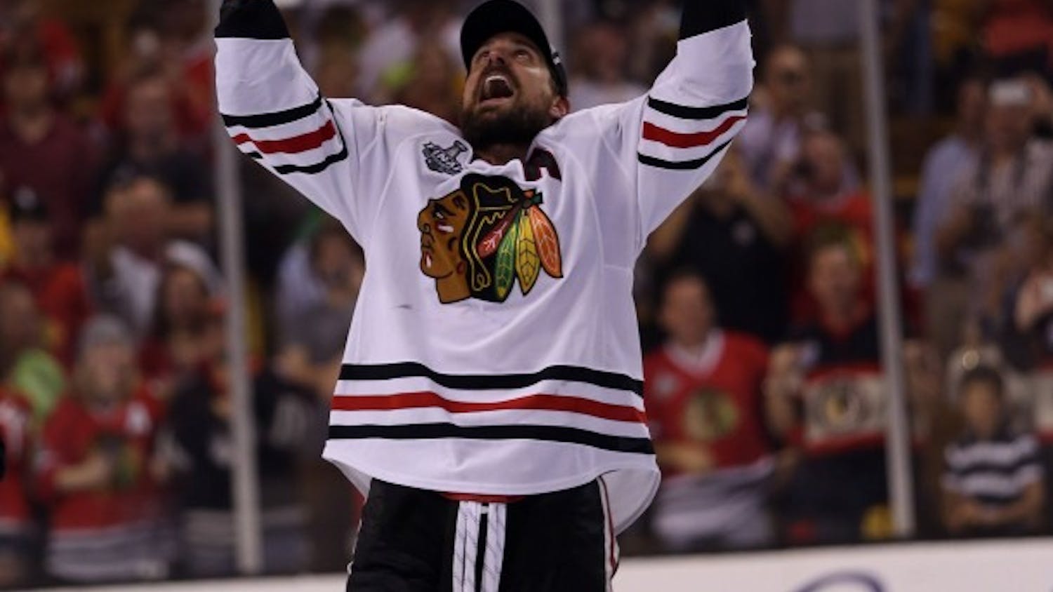 Blackhawks center Patrick Sharp lifts the trophy after Chicago defeated the Boston Bruins, 3-2, to win the Stanley Cup at TD Garden in Boston, Massachusetts, Monday, June 22, 2013. (Scott Strazzante/Chicago Tribune/MCT)