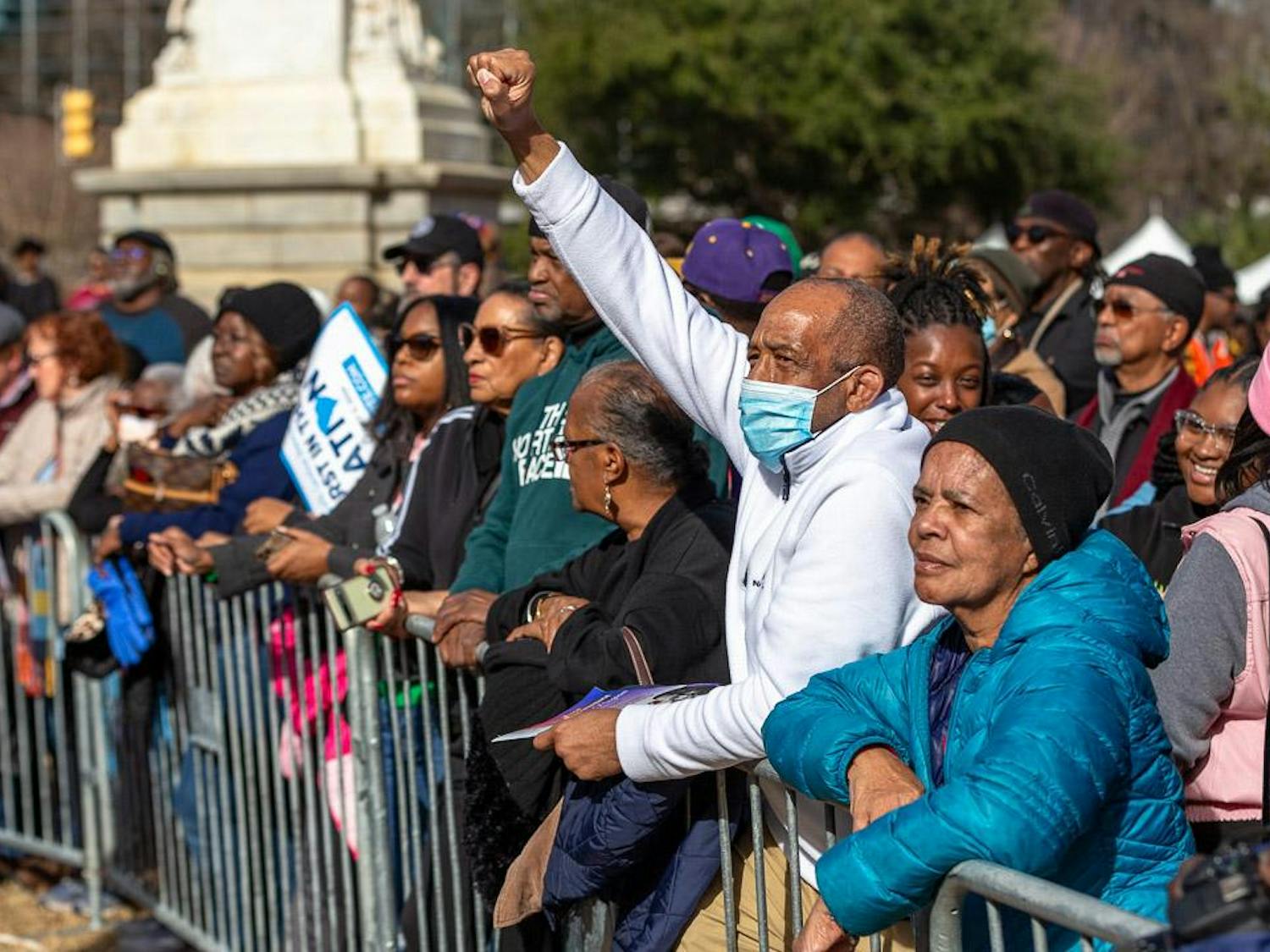 Clarence Jenkins Jr., 53, raises his fist in solidarity during the King Day at the Dome event on Jan. 15, 2024. The event featured speeches from community, state and national leaders, honoring Dr. Martin Luther King Jr. and calling for everyone to vote for freedom, justice and change.