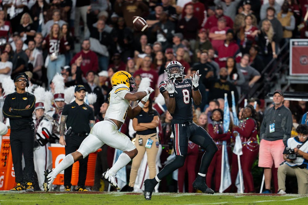 <p>Sophomore wide receiver Nyck Harbor&nbsp;catches the ball and runs to the end zone for a touchdown in South Carolina's game against Missouri on Saturday. The Gamecocks defeated the Missouri Tigers 34-30 at Williams-Brice Stadium.</p>