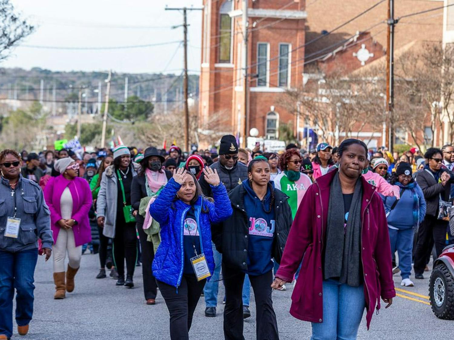 Members of the community march toward the South Carolina Statehouse before the King Day at the Dome event on Jan. 15, 2024. The annual event starts with a church service commemorating Dr. Martin Luther King Jr. at Zion Baptist Church and transitions to the South Carolina Statehouse where civil rights leaders, state representatives and national leaders give speeches commemorating Dr. King and his continued legacy for equality.