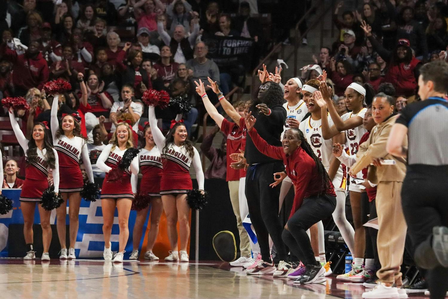 The Gamecock bench celebrates after a 3-point shot is made during South Carolina's game against North Carolina in round two of the NCAA Women's Tournament on March 24, 2024. The Gamecocks put up nine 3-pointers in its 88-41 victory over the Tar Heels.