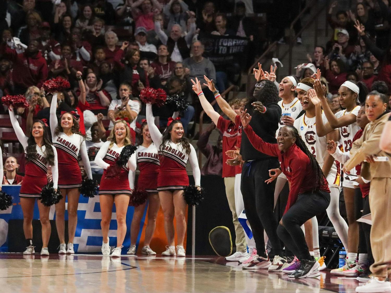 The Gamecock bench celebrates after a 3-point shot is made during South Carolina's game against North Carolina in round two of the NCAA Women's Tournament on March 24, 2024. The Gamecocks put up nine 3-pointers in its 88-41 victory over the Tar Heels.