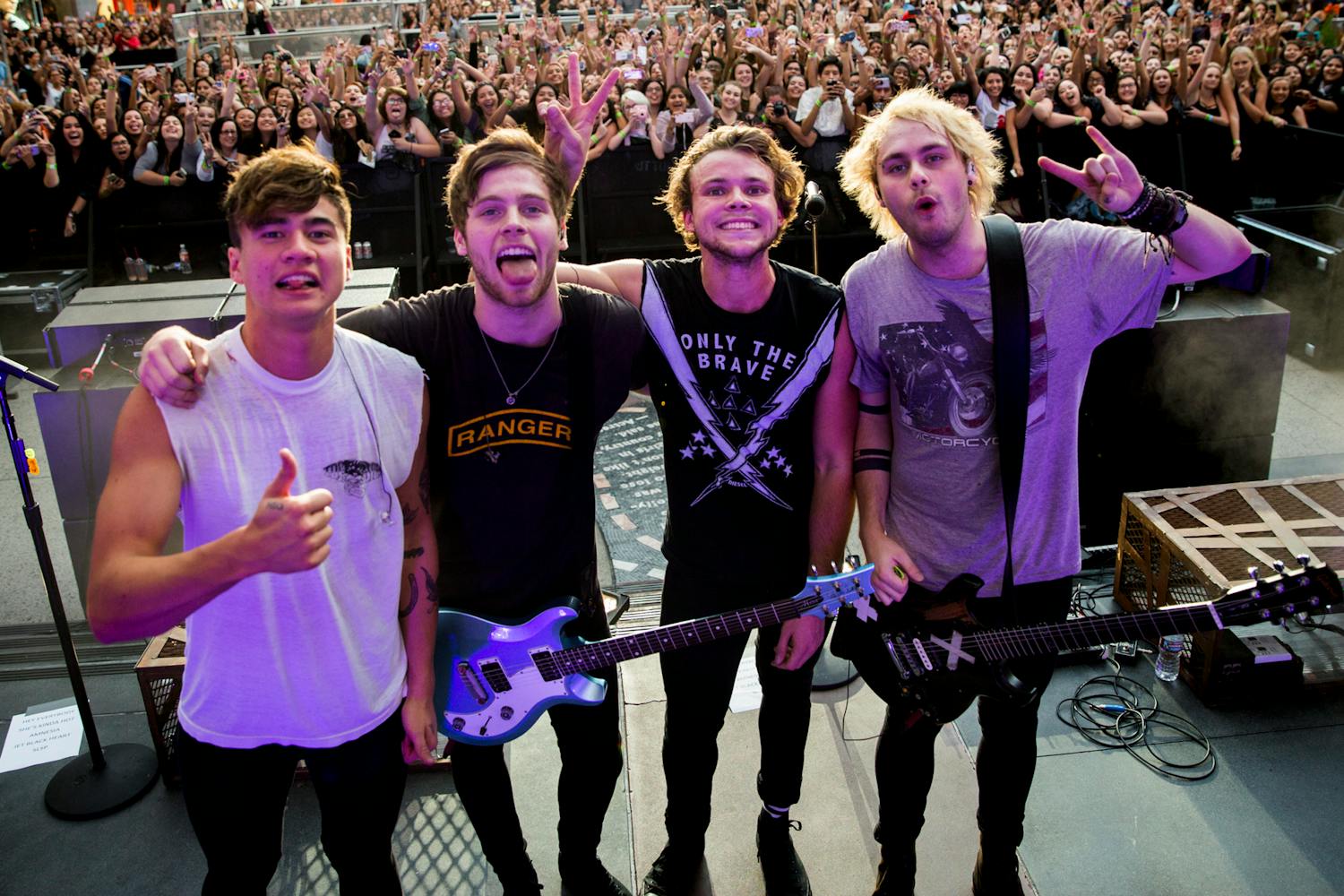 Australian pop band 5 Seconds of Summer members, from left, Calum Hood, Luke Hemmings, Ashton Irwin and Michael Clifford, following their performance at Hollywood & Highland Center on Oct. 23, 2015, in Hollywood, California. The group released their fifth album, 5SOS5, on Sept. 23, 2022. (Jay L. Clendenin/Los Angeles Times/TNS)