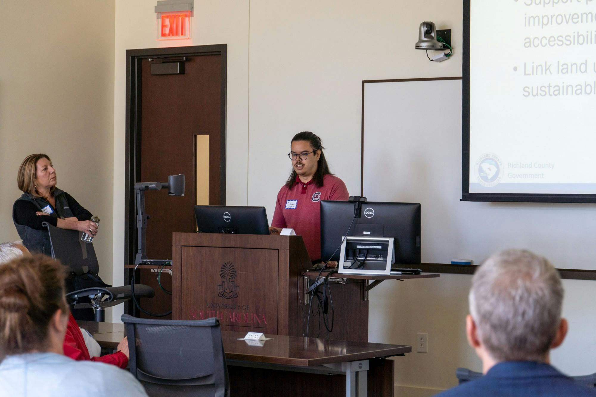 Climate Ready Columbia panelist Marc Ridlehoover gives presentation on the city's vision for revitalizing Columbia's streets during a panel on April 2, 2022. &nbsp;Lucinda Statler, Planning Administrator for the city of Columbia and Ridlehoover both held presentations advocating for a more pedestrian and bicyclist friendly Columbia.