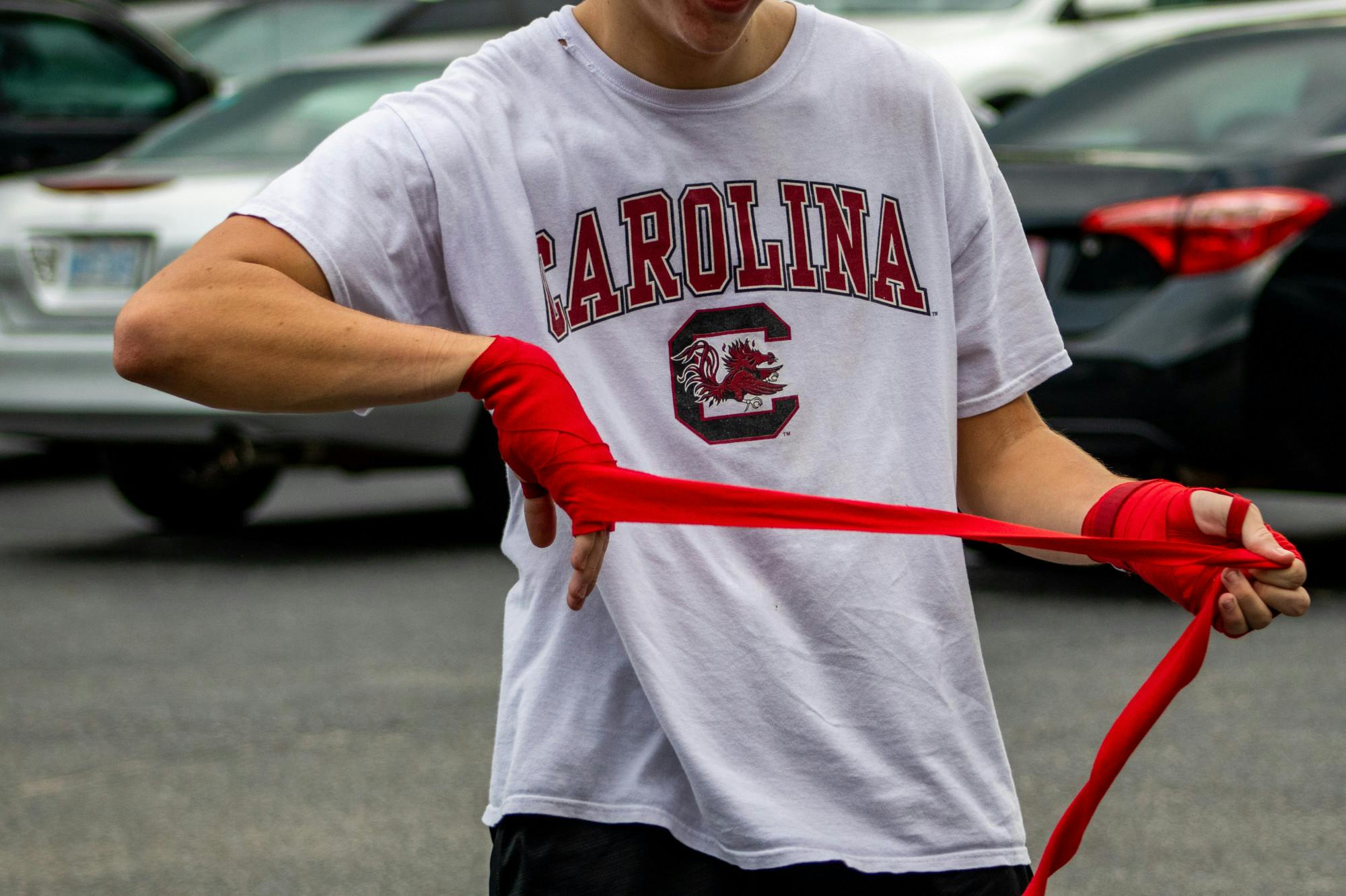 A member of the Carolina Boxing Club wraps his hands before practice. The Carolina Boxing Club gathered Sept.12, 2022, at Battle Boxing Gym to prepare for their upcoming season
