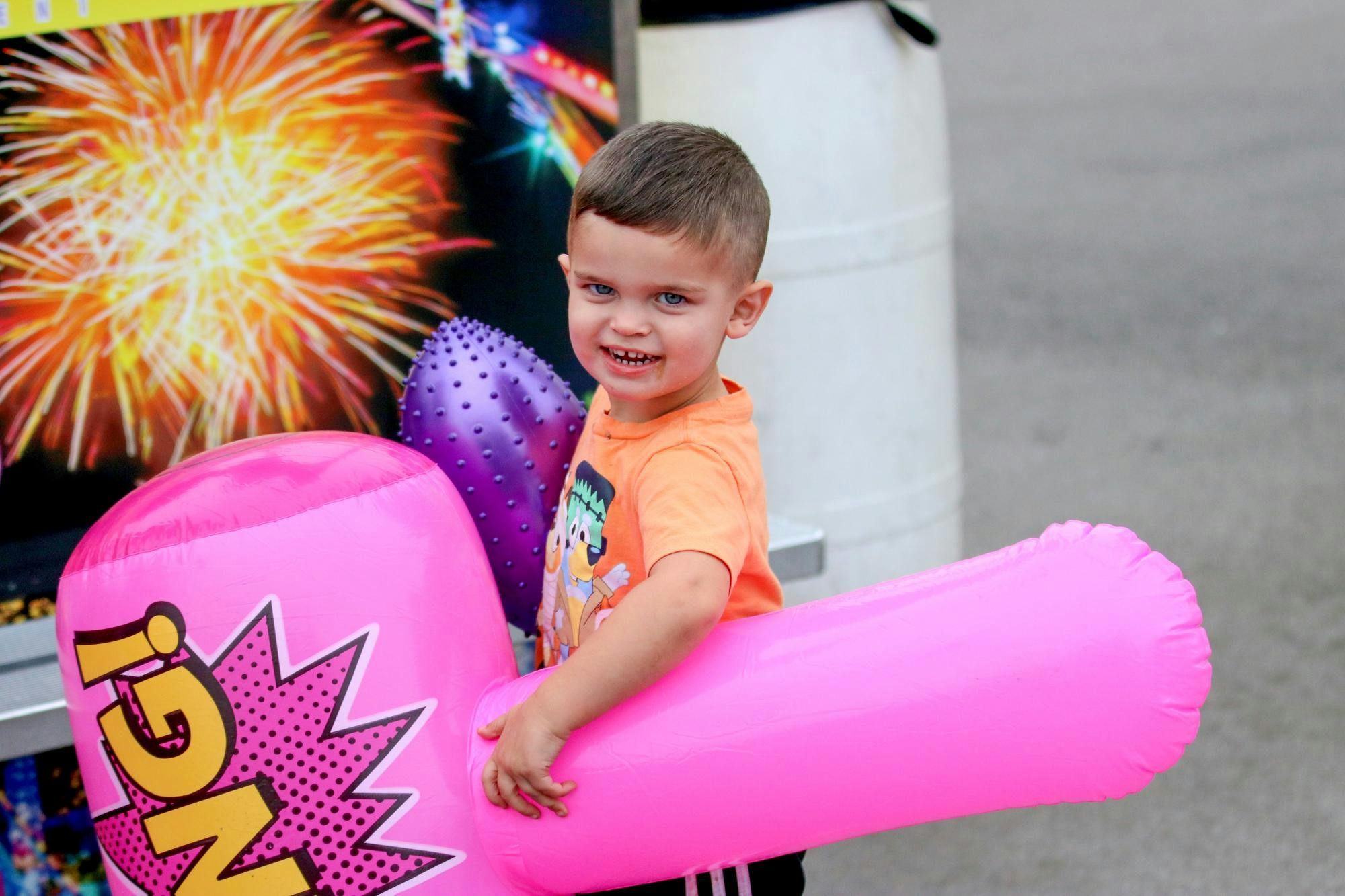 A young boy holds a prize he won from a carnival game at the South Carolina State Fair on Oct. 10, 2025. The fair celebrated a theme of "Harvesting Happiness," offering rides, carnival games, food, livestock and performances for visitors.