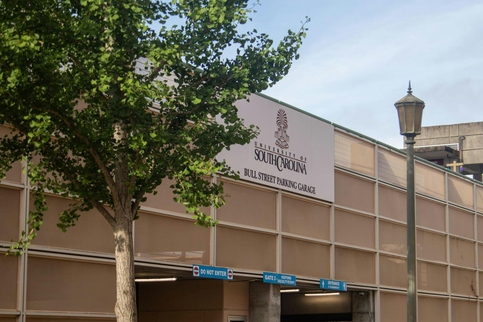 The front sign of the Bull Street parking garage is seen on the University of South Carolina campus on July 8, 2024. The University of South Carolina’s Parking and Transportation Services began selling parking permits with increased pricing and fees this academic year for the first time since 2016-17.