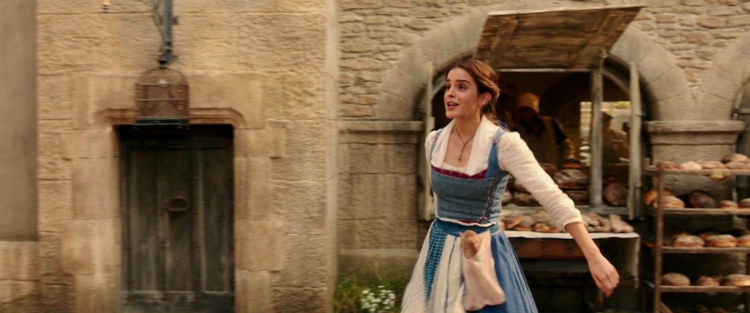 Emma Watson as Belle in a scene from the movie "Beauty and the Beast" directed by Bill Condon. (Walt Disney Pictures/TNS)