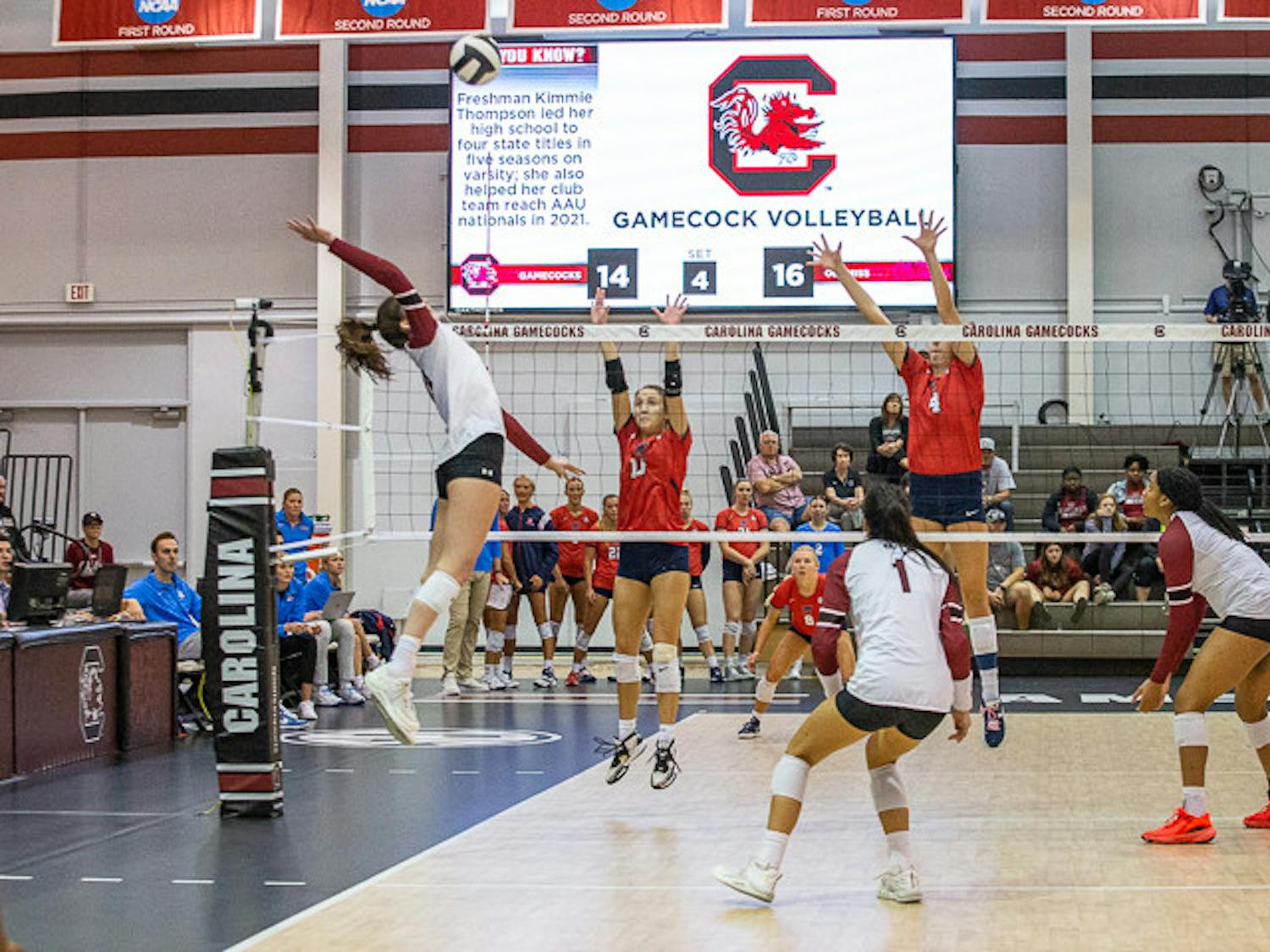 Freshman outside hitter Alayna Johnson spikes the ball during the fourth set of the game on Nov. 5, 2022. The Rebels beat the Gamecock 3-1 in the second game of the series.&nbsp;