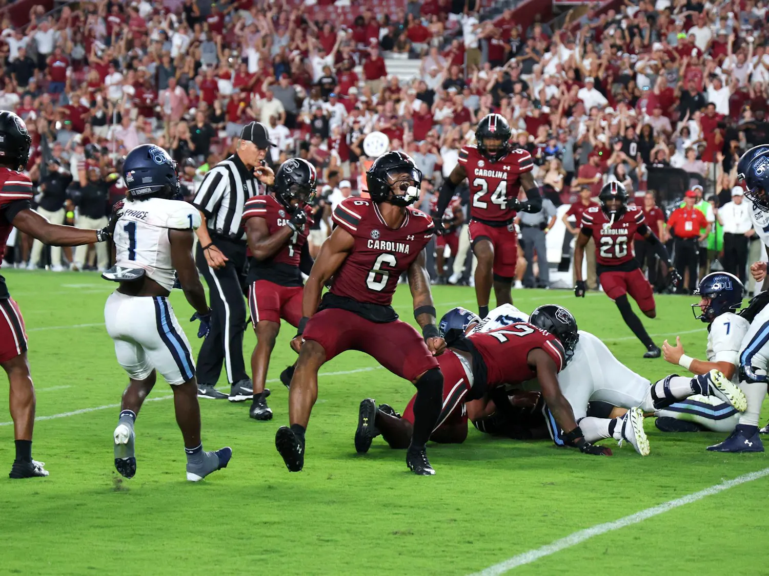 Junior edge Dylan Stewart celebrates after forcing Old Dominion to fumble the ball in the fourth quarter of the teams' matchup on Aug. 31, 2024. Stewart recorded four total tackles, 1.5 sacks and two forced fumbles in his first game for the Gamecocks.