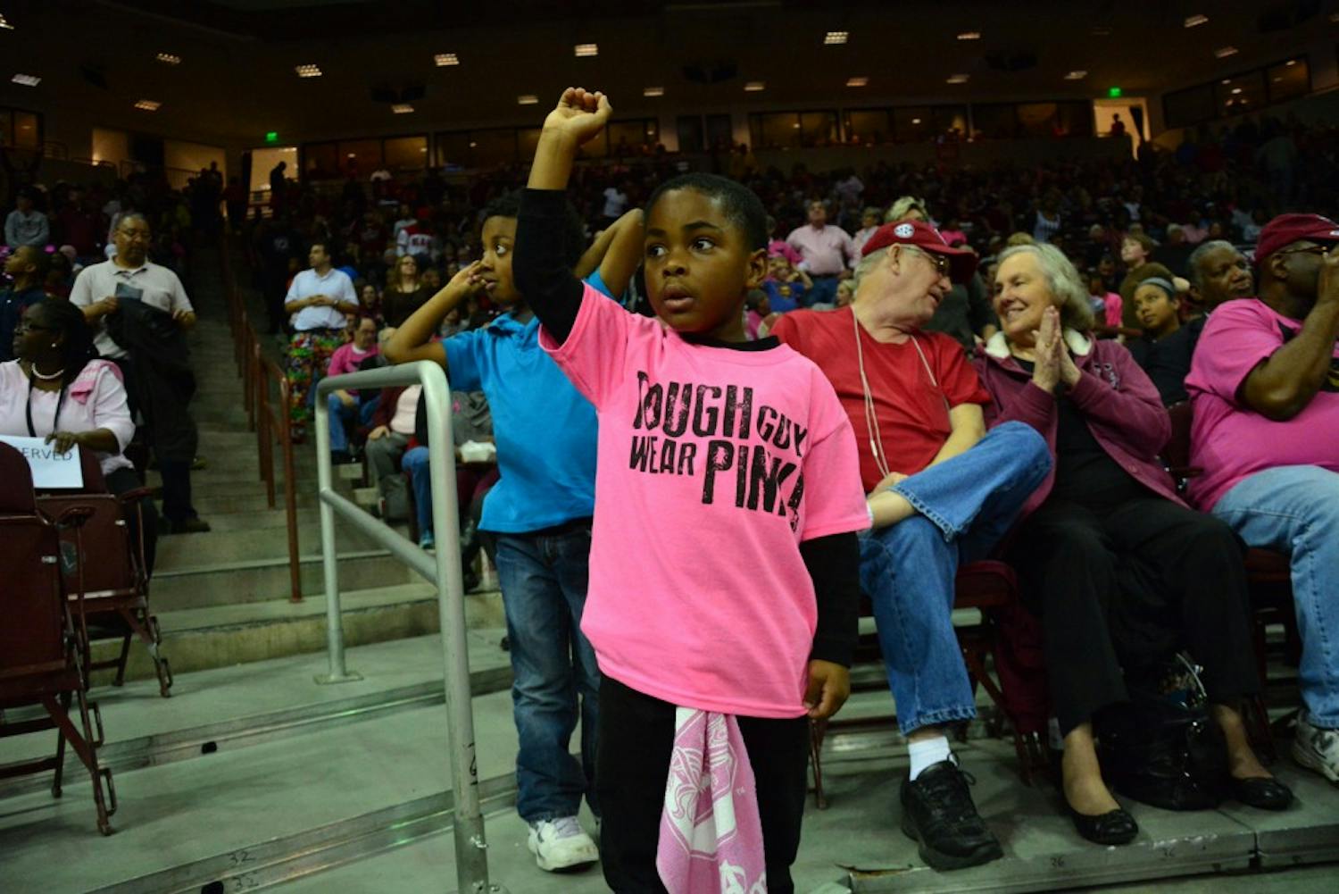 Who says pink is for girls? Both USC and UGA fans of all ages came together at the women's basketball match on Thursday night to aid in breast cancer awareness. South Carolina Gamecocks vs Georgia Bulldogs. Colonial Life Arena, Columbia, SC. February 18, 2016