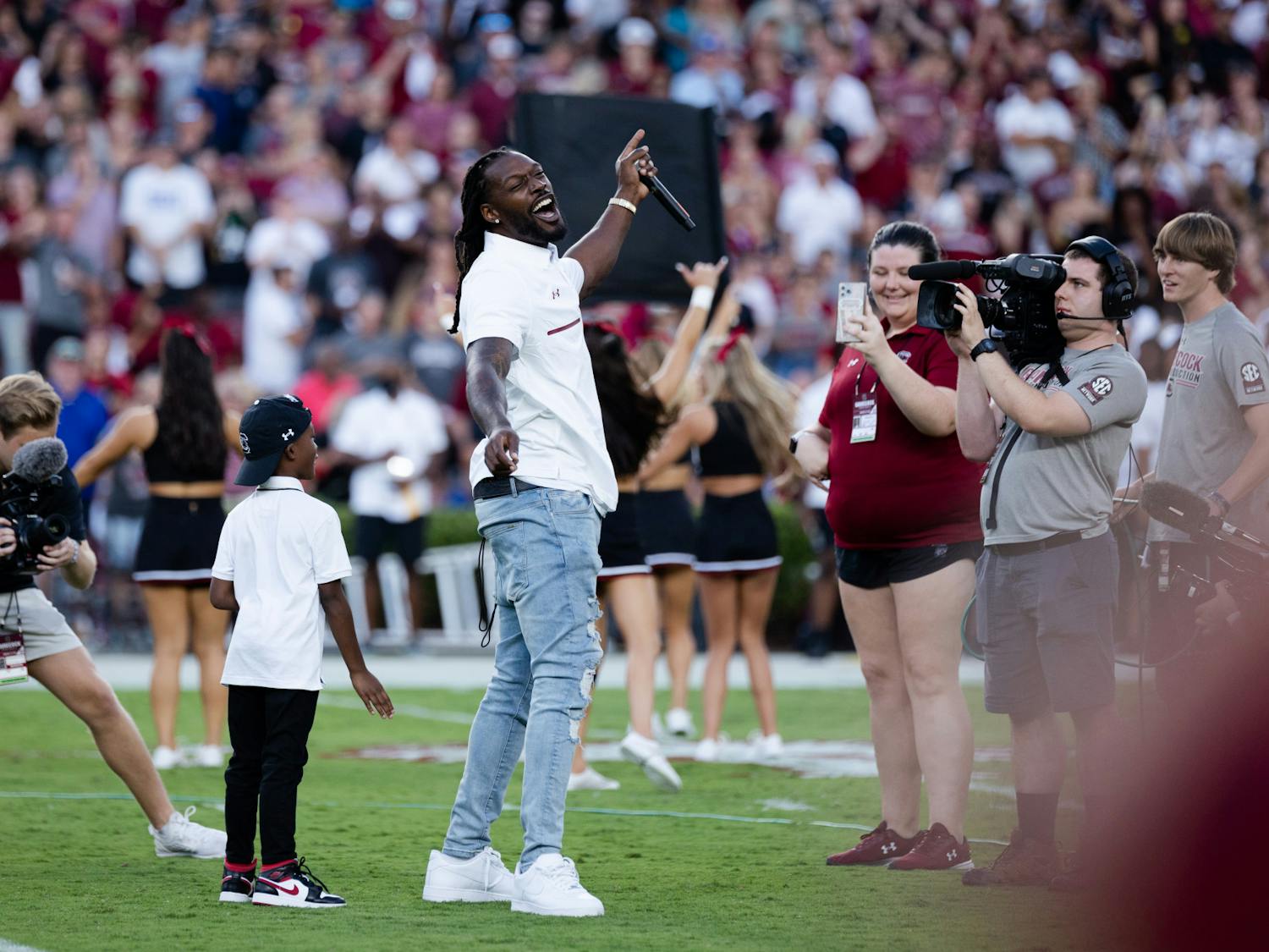 Former Gamecock defensive end Jadeveon Clowney leads the crowd in a chant during the game against Georgia State on Sept. 3, 2022. Clowney's jersey was retired during halftime. 