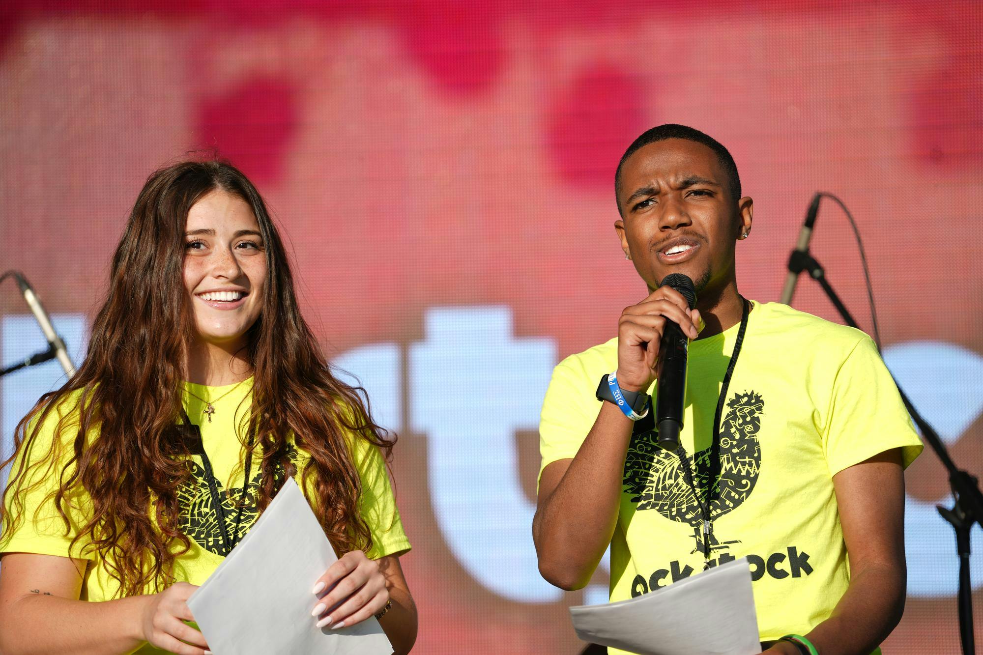 Event hosts take the stage, energizing the crowd and guiding the night’s lineup during Cockstock at the University of South Carolina.