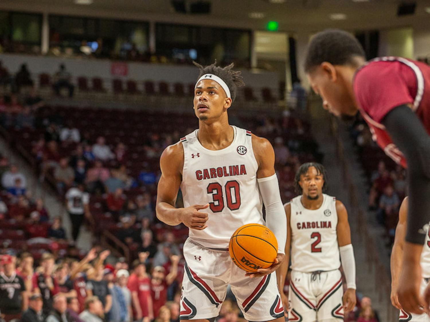 Freshman forward Daniel Hankins-Sanford calibrates his shot at the free-point line. Hankins-Sanford made both shots to get the Gamecocks two points against the S.C. State Bulldogs on Nov. 8, 2022.