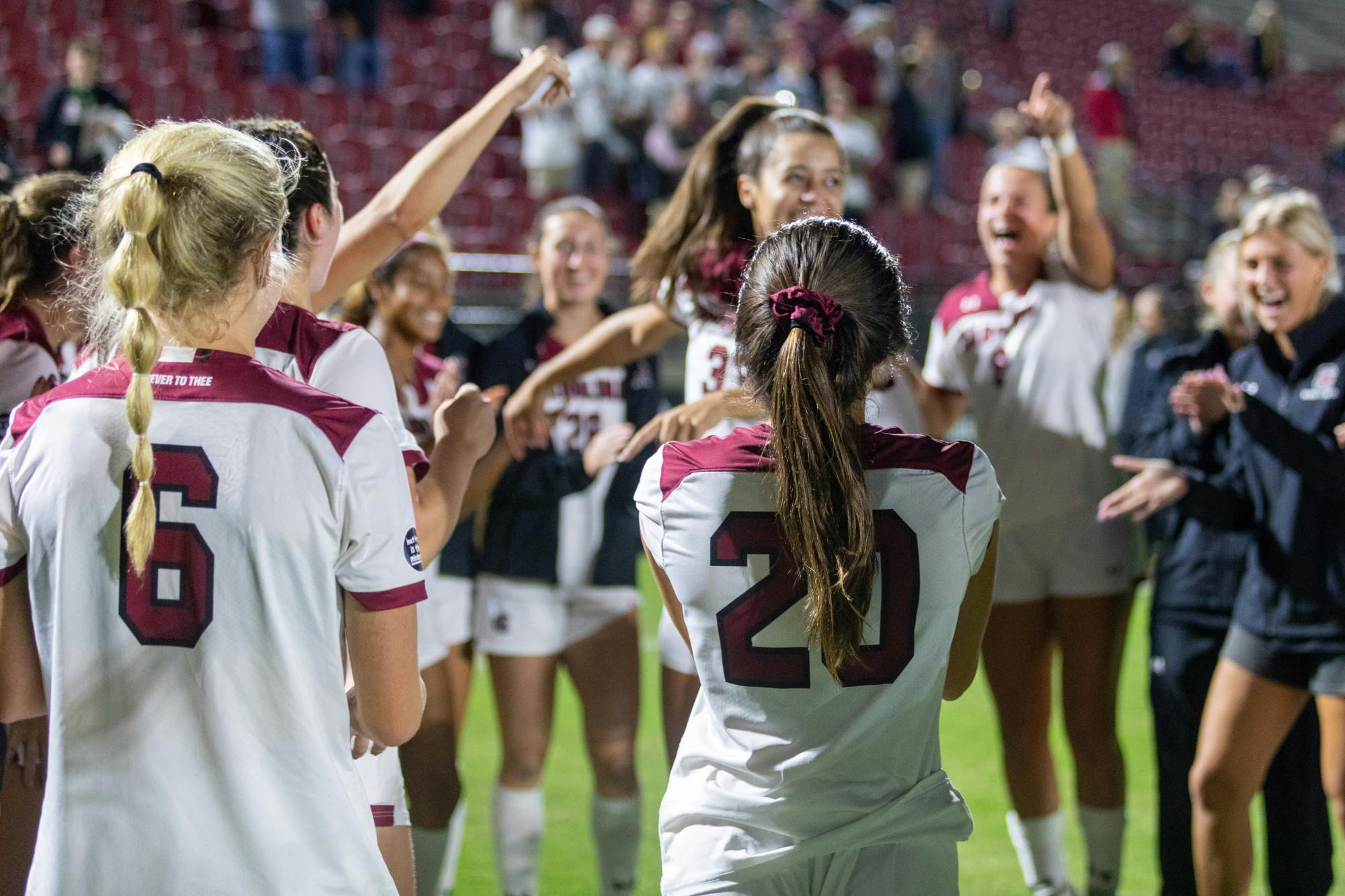 FILE— Senior defender Camryn Dixon and junior forward Corinna Zullo celebrate with their team after the win against Missouri on Oct. 27, 2022. After Thursday’s result on Nov. 3, 2022 there will be a title matchup between No. 1 seed Alabama and No. 2 seed South Carolina, regular season winners of the SEC West and East respectively.&nbsp;
