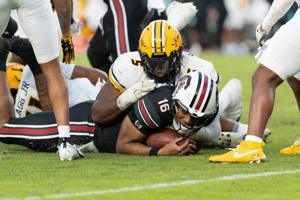 <p>FILE — Then-redshirt freshman quarterback LaNorris Sellers gets tackled by a Mizzou defender as he tries to run the ball on Nov. 16, 2024 at Williams-Brice Stadium. The Gamecocks will face the Tigers on Sept. 20, 2025 in Columbia, Missouri.</p>