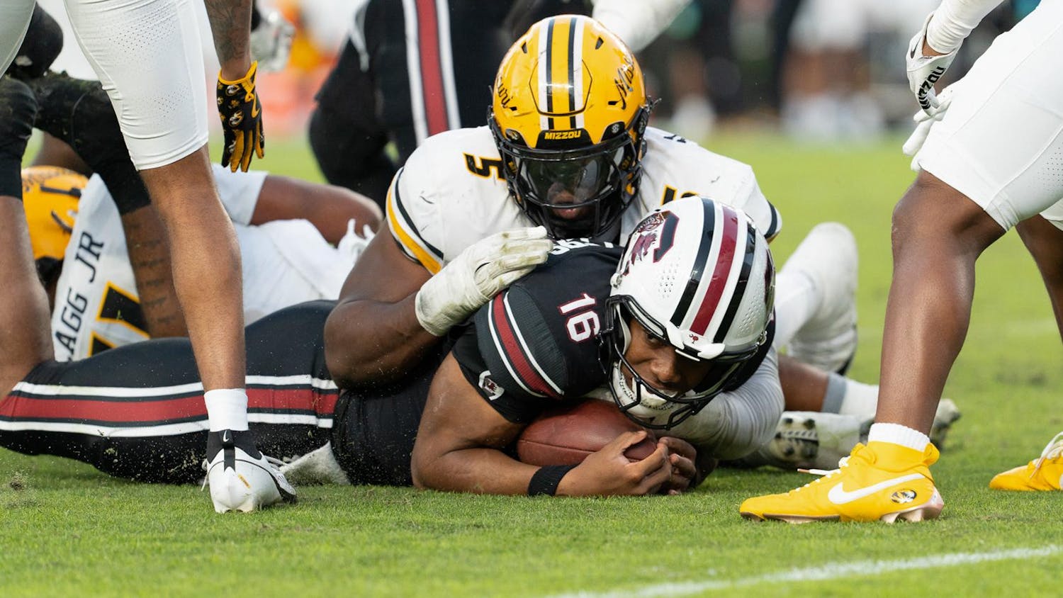 FILE — Then-redshirt freshman quarterback LaNorris Sellers gets tackled by a Mizzou defender as he tries to run the ball on Nov. 16, 2024 at Williams-Brice Stadium. The Gamecocks will face the Tigers on Sept. 20, 2025 in Columbia, Missouri.