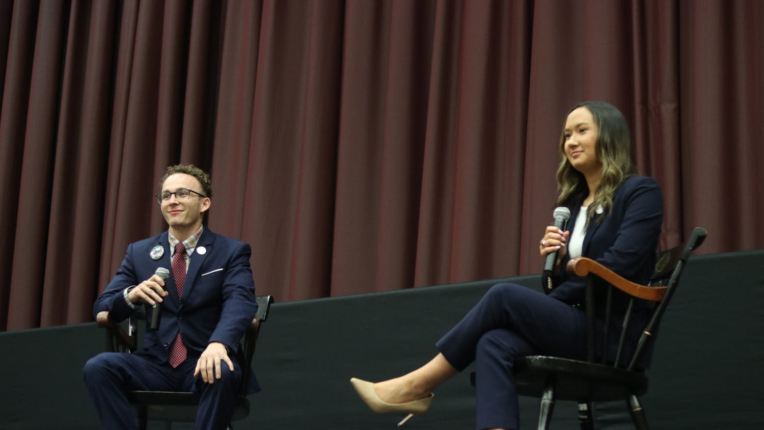 Student body presidential candidates third-year political science student Reilly Arford (left) and third-year public relations student Emily "Emmie" Thompson (right) on stage debating on Feb. 15, 2023. They are the only two presidential candidates this election season.&nbsp;