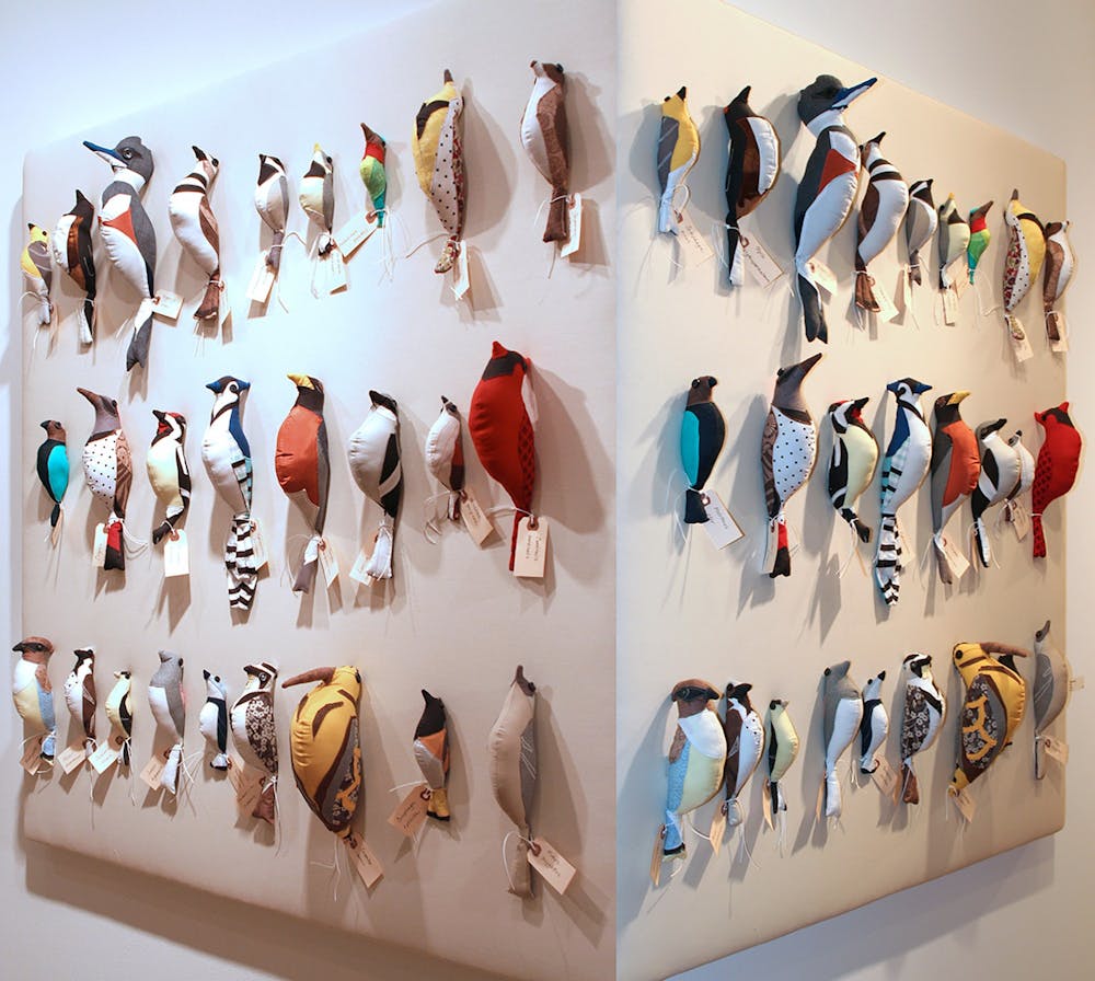 Collection of the stuffed birds handcrafted by Eloisa Guanlao, sewn from her children’s outgrown clothing.