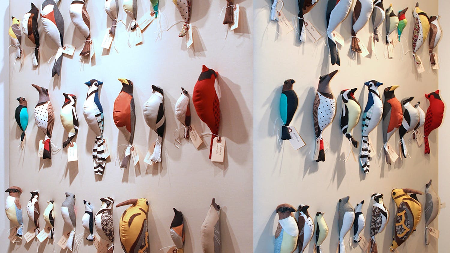 Collection of the stuffed birds handcrafted by Eloisa Guanlao, sewn from her children’s outgrown clothing.