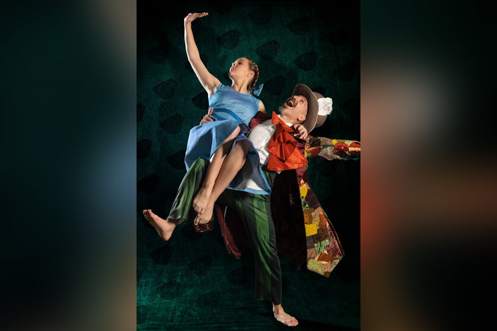 <p>Shown: Assistant Professor of Dance André Megerdichian as the Mad Hatter and second-year dance education student Bailey Brown as Alice in <em>Wonderland</em>. The dance theatre adaptation of the classic <em>Alice in Wonderland</em> will be shown at Drayton Hall Theatre from Feb. 9-11.</p>