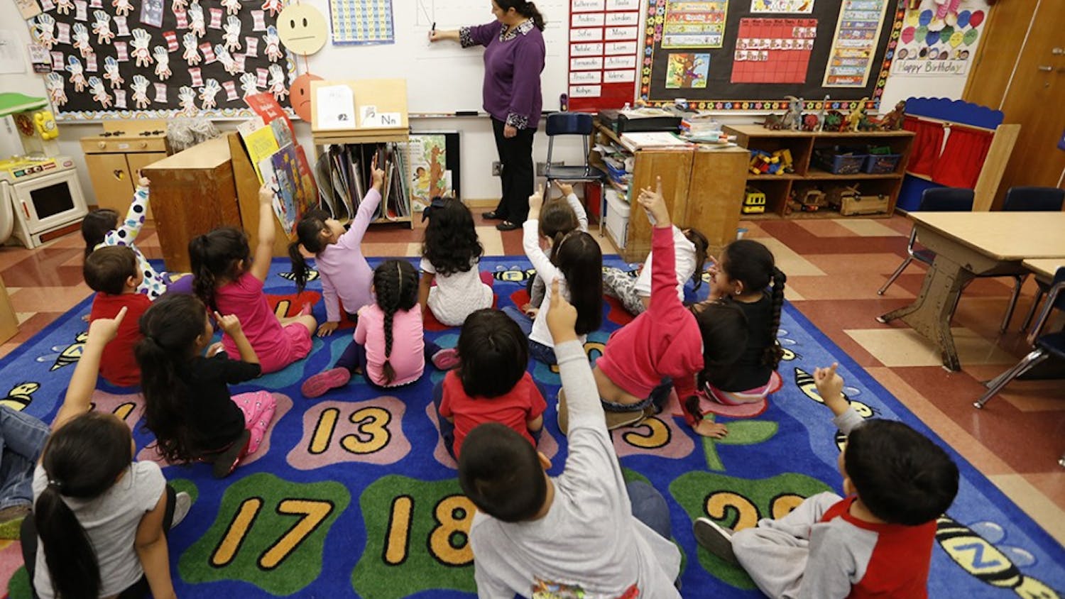 A kindergarten class at Dorris Place Elementary School in Los Angeles in May 2015. A study presented Wednesday, Sept. 28, 2016, to a meeting of education policy officials, researchers found that pre-K educators who were prompted to expect trouble in a classroom trained their gaze significantly longer on black students, especially boys. (Al Seib/Los Angeles Times/TNS)
