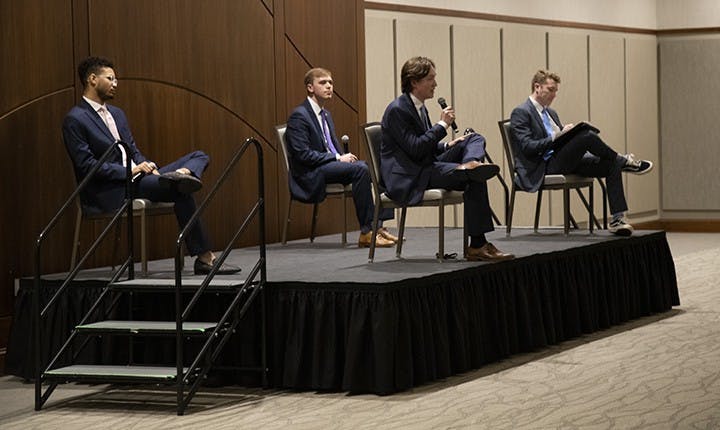 Student body president candidates (from left to right) Aidan Baker, Alex Harrell and Cameron Butler listen to Caden Askew's answer to a question. The candidates were asked a series of general questions, individual questions and questions pulled from social media.