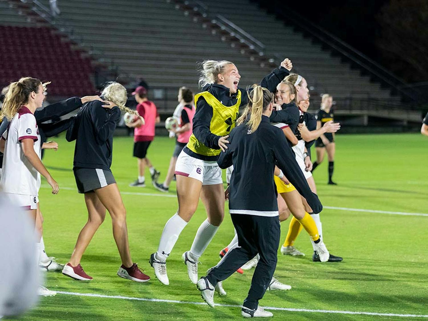 The Gamecocks celebrate on the field after the matchup against Missouri on Oct. 27, 2022. The Gamecocks beat Missouri 2-0 and clinched the SEC East with the win.
