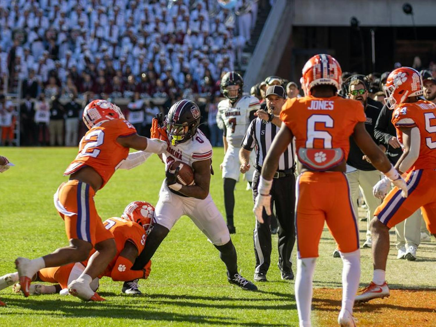 FILE — Junior tight end Jaheim Bell is pushed out of bounds by a member of Clemson's defense on Nov. 26, 2022, at Memorial Stadium. South Carolina will be facing off against Clemson on Saturday at 7:30 p.m. in Williams-Brice Stadium.