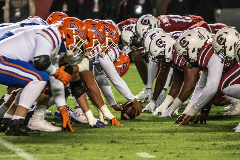 <p>South Carolina’s defense gets ready for the snap in an NCAA football game against Florida Saturday, Nov. 6, 2021 in Columbia, SC. The Gamecocks won 40-17.</p>