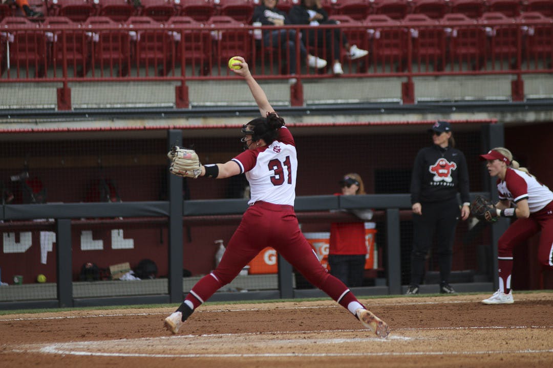 Senior pitcher Karsen Ochs throws a pitch during the match against Western Kentucky University at Beckham Field on Feb. 19, 2023. The Gamecocks beat the Hilltoppers 11-2.