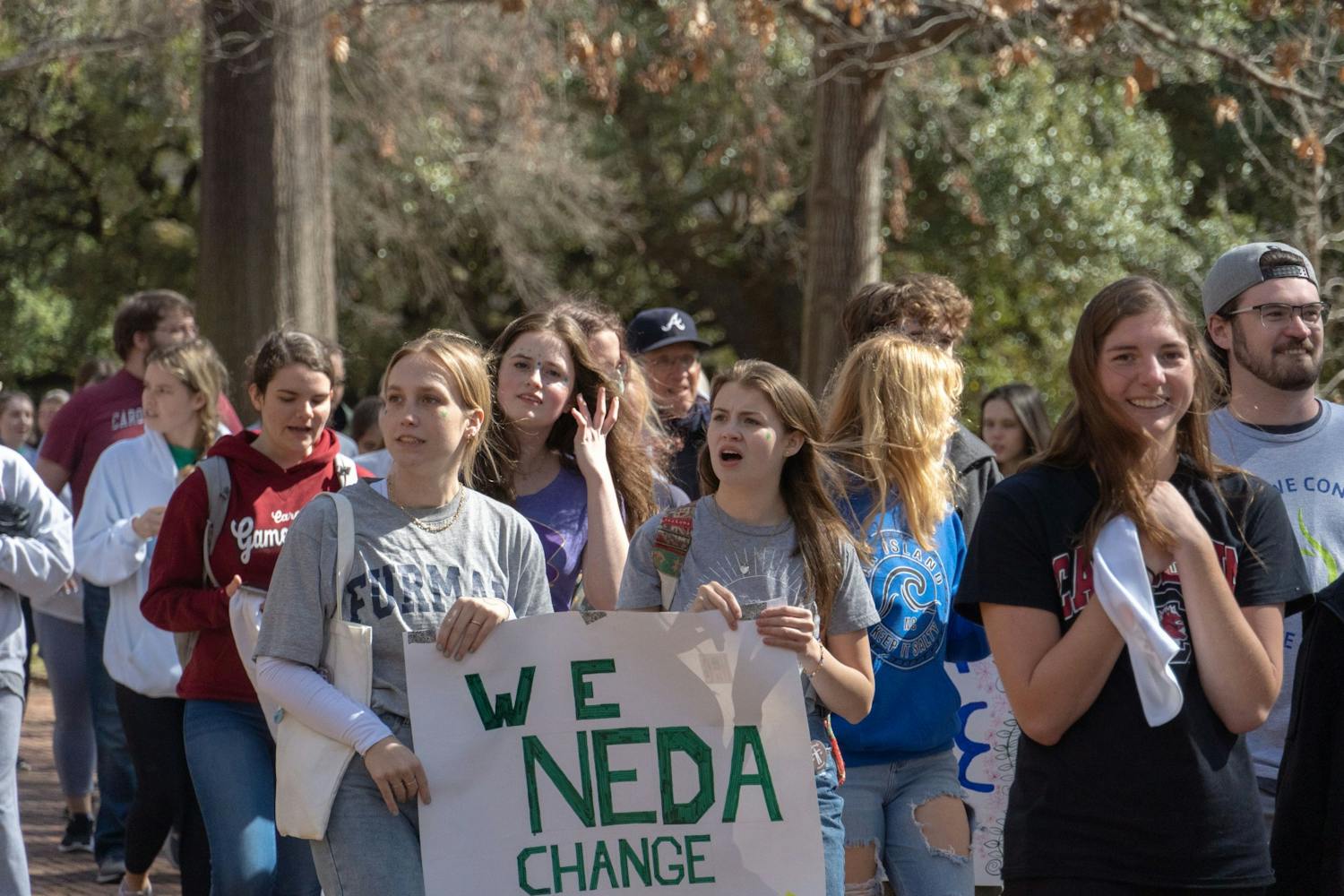 Community members and supporters of NEDA walk across ɫɫƵ's campus on Feb. 26, 2022.The NEDA Walk took place as a charity event raise support, money, and awareness for those who effected by eating disorders.