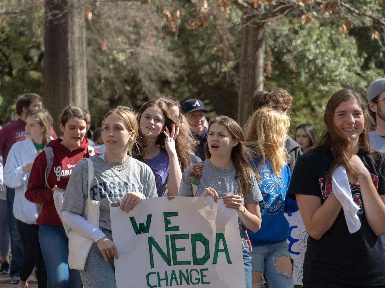 Community members and supporters of NEDA walk across USC's campus on Feb. 26, 2022.The NEDA Walk took place as a charity event raise support, money, and awareness for those who effected by eating disorders.