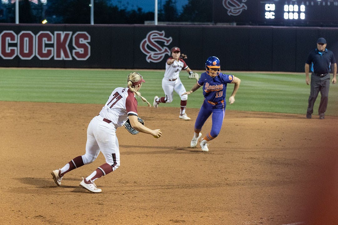 Senior infielder Kassidy Krupit heading back to first base to out a Clemson player attempting to steal second base on April 12, 2022 at the Carolina Softball Stadium in Columbia, SC. Krupit made seven putouts during the game against Clemson.