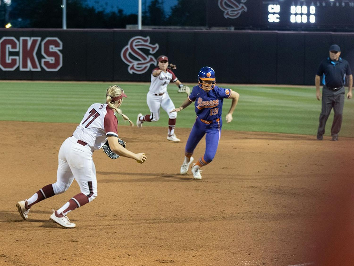 Senior infielder Kassidy Krupit heading back to first base to out a Clemson player attempting to steal second base on April 12, 2022 at the Carolina Softball Stadium in Columbia, SC. Krupit made seven putouts during the game against Clemson.