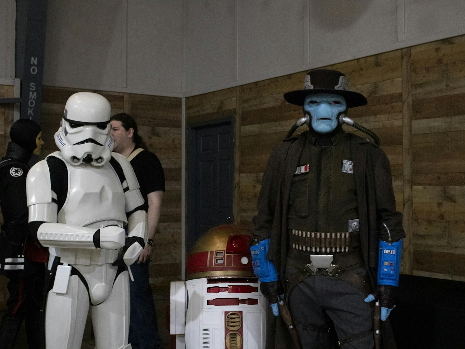 Cad Bane, a stormtrooper, and an R2 Unit from the "Star Wars" franchise pose for a quick photo at Columbia Brick Con on March 25, 2023. Costume players, better known as 'cosplayers,' were in attendance through S.C. Bricks LEGO User Group.