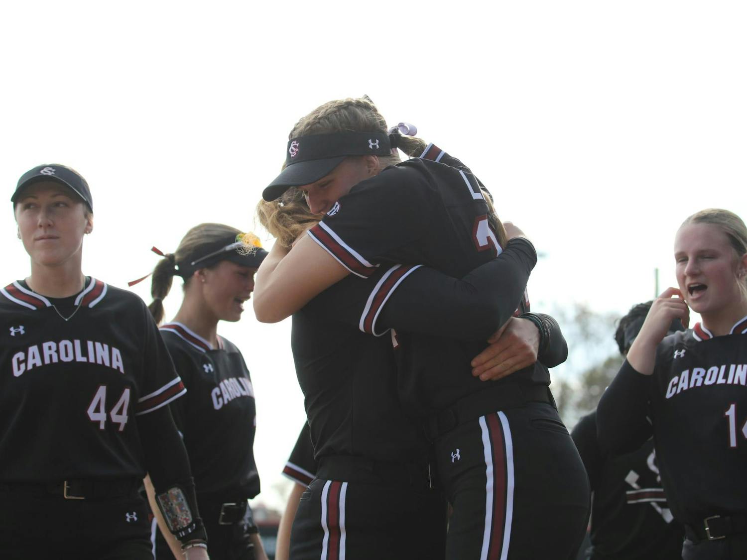 Sixth-year pitcher Sam Gress and sophomore pitcher Nealy Lamb hug before the game against East Carolina on Feb 9, 2025. The Gamecocks defeated the Pirates in the last game of the Gamecock Invitational.