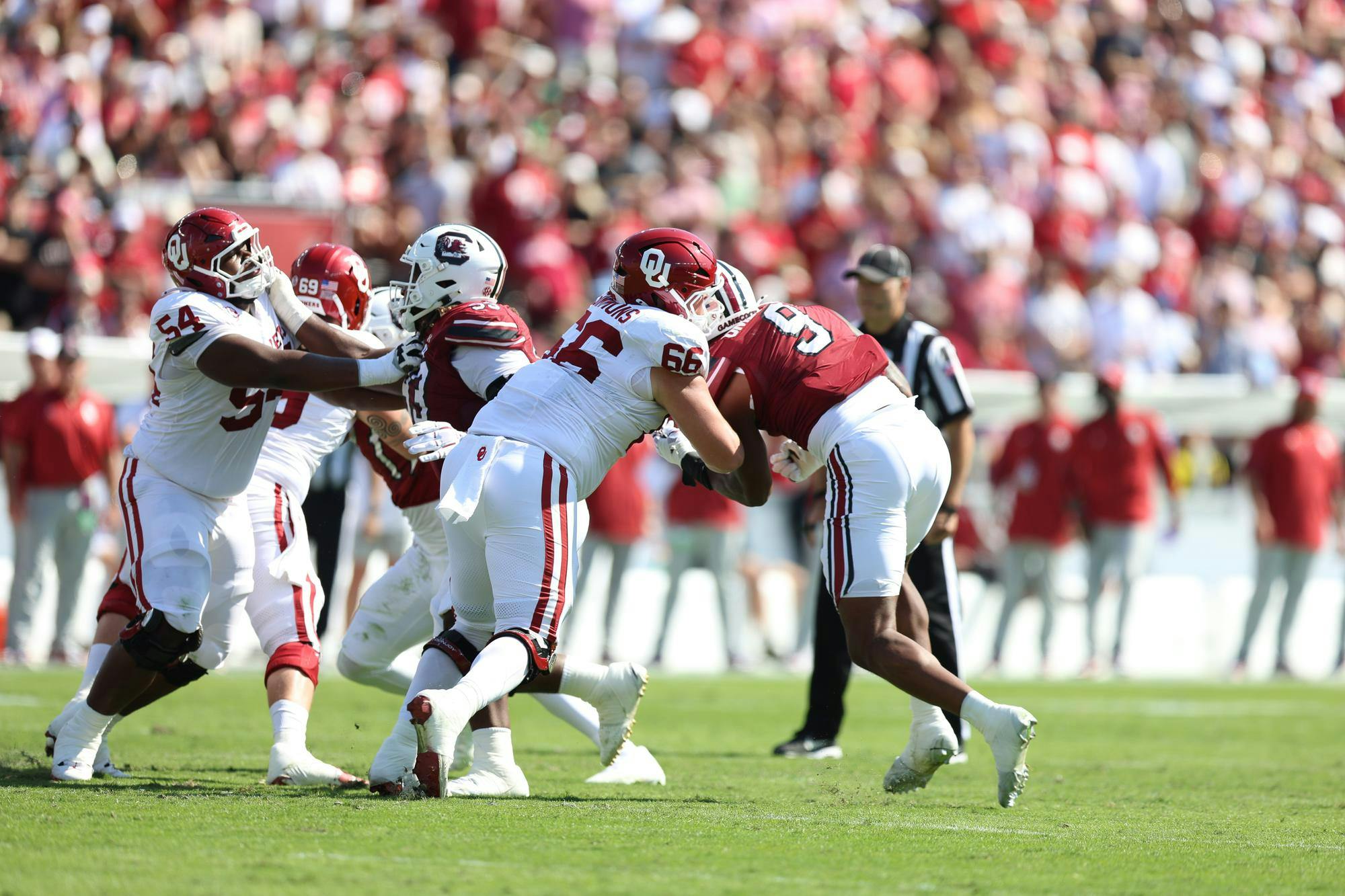 A group of players collide in a fight for the ball. The South Carolina Gamecocks played against the Oklahoma Sooners in the afternoon on Saturday, Oct. 18, 2025,  at Williams-Brice Stadium.&nbsp;