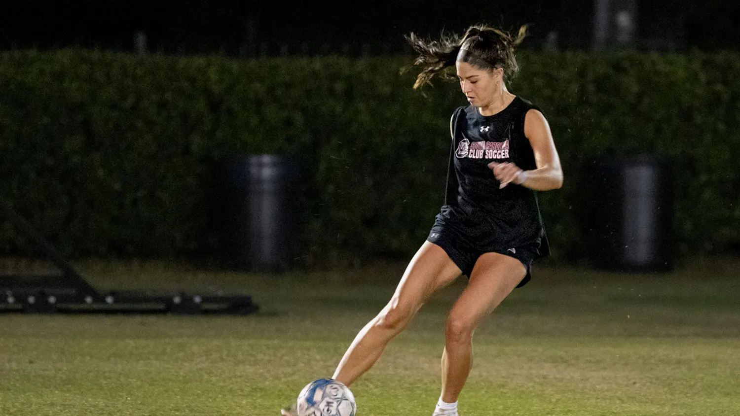 Fourth-year criminal justice and psychology student Juliet Ballard prepares to pass the ball during women's club soccer practice on Oct. 26, 2023. This year is the first time in club history that the Gamecocks are participating in the National Intramural and Recreational Sports Association National Soccer Championships.